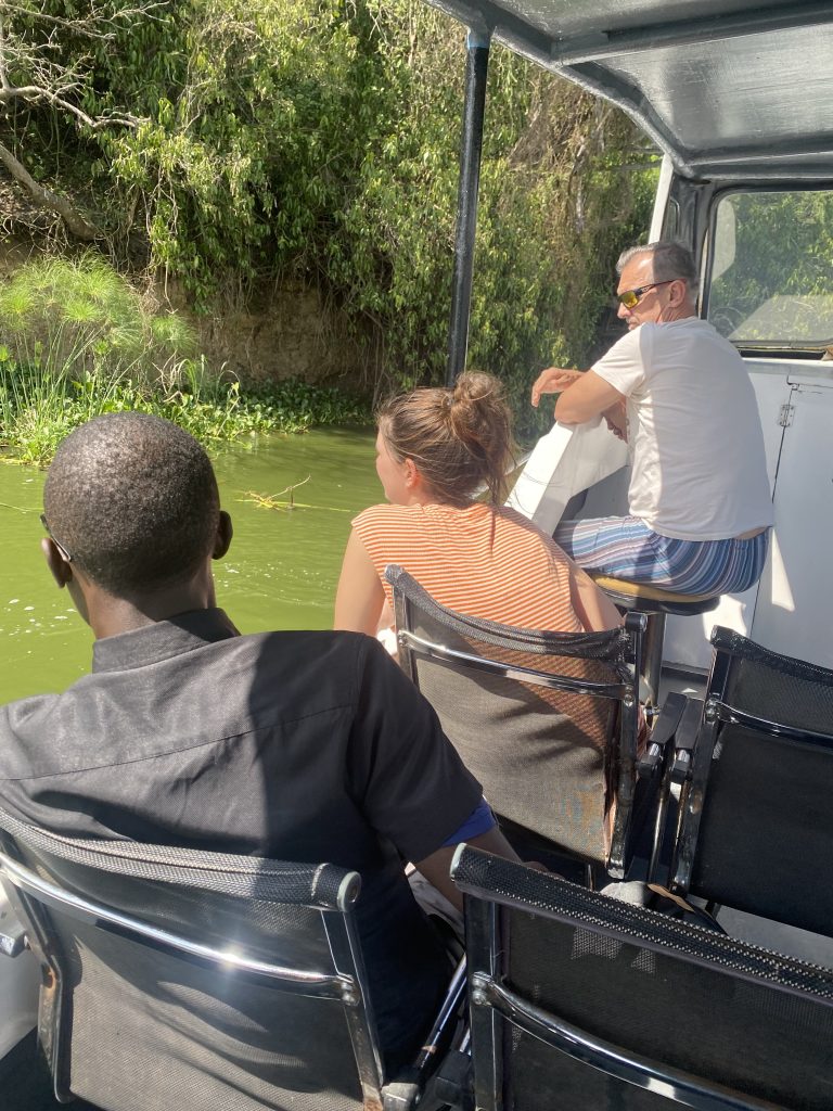 Best Tour Operators in Uganda: Your Guide to Unforgettable Safaris.With WORLD BLOSSOM SAFARIS clients enjoying boat trip