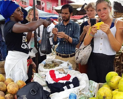 Local Market Tour in Uganda. With clients enjoying